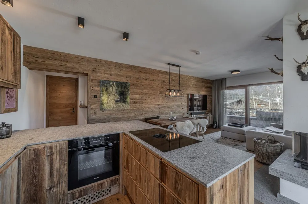 KITZIMMO-Luxuswohnung mit Kaiserblick in Toplage kaufen - Immobilien Oberndorf.