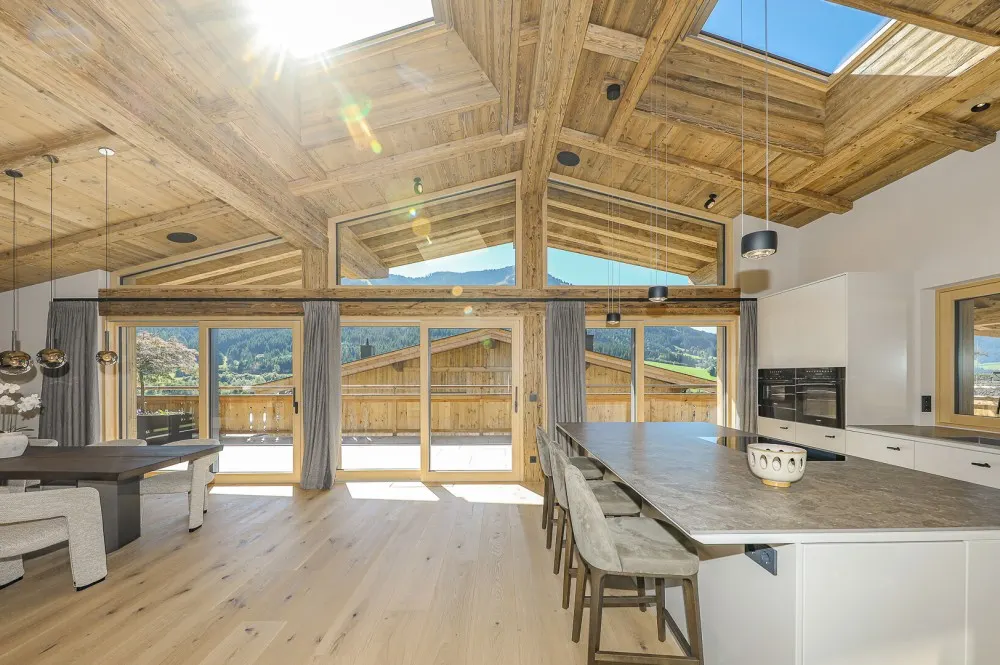 KITZIMMO-Luxuspenthouse sonniger Toplage mit Panorama-Ausblick - Immobilien Brixen.