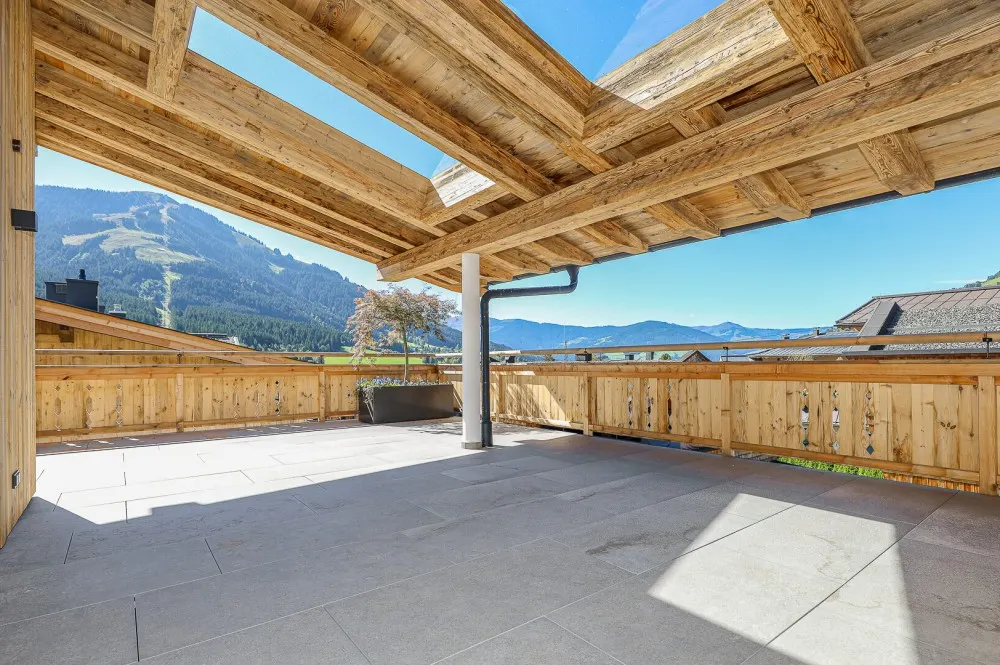 KITZIMMO-Luxuspenthouse sonniger Toplage mit Panorama-Ausblick - Immobilien Brixen.