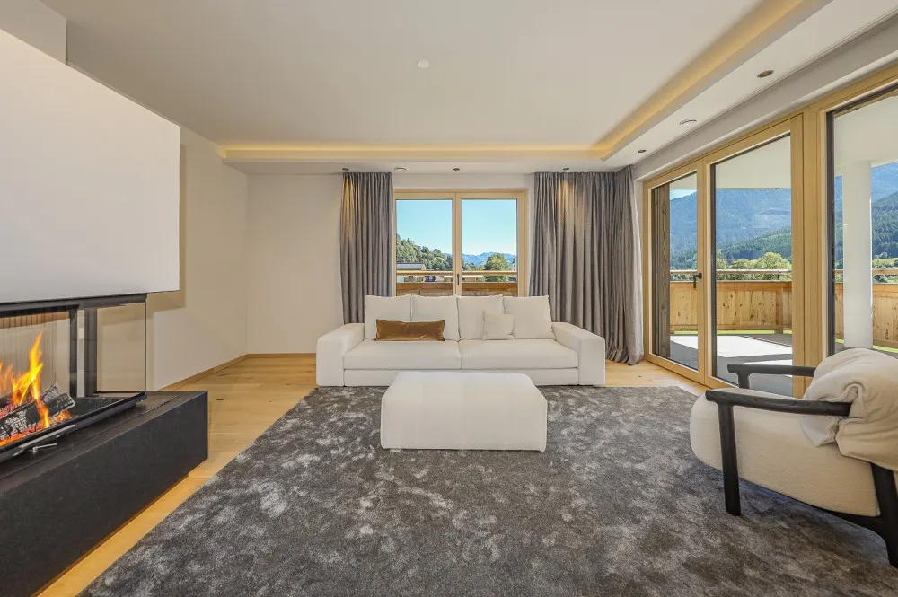 KITZIMMO-Exklusive Neubauwohnung mit traumhaftem Ausblick - Immobilien Brixen.