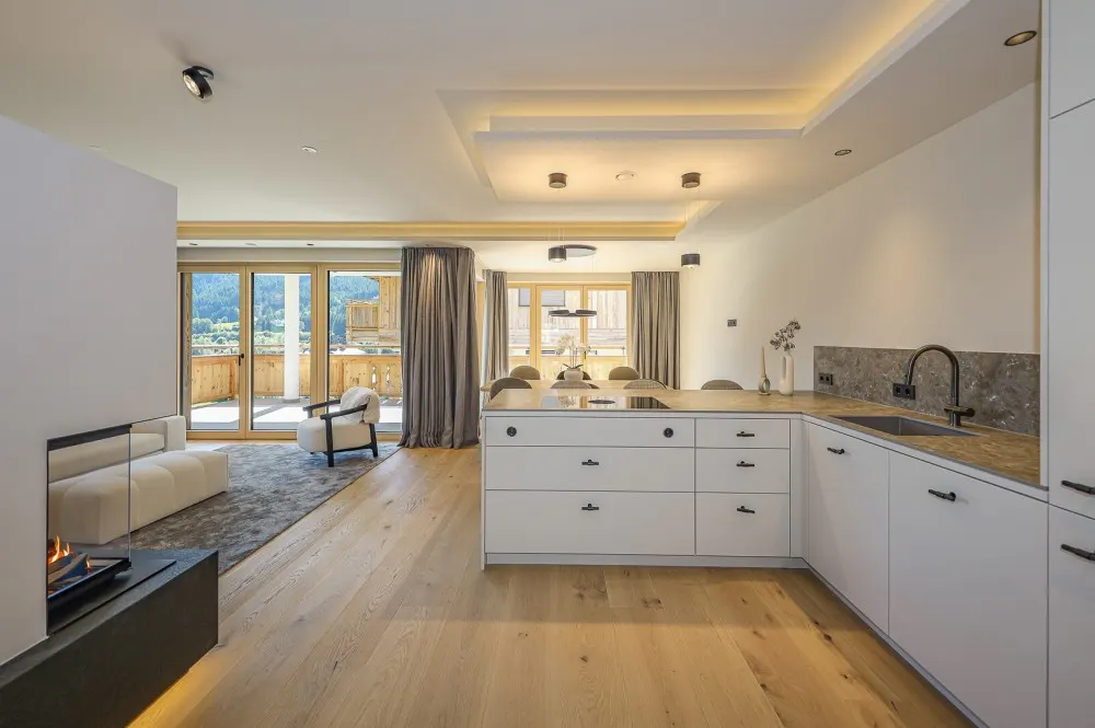 KITZIMMO-Exklusive Neubauwohnung mit traumhaftem Ausblick - Immobilien Brixen.