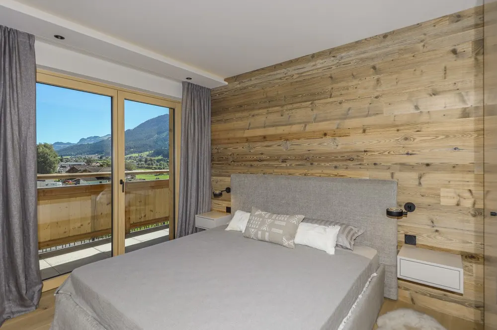 KITZIMMO-Exklusive Neubauwohnung mit traumhaftem Ausblick - Immobilien Brixen.