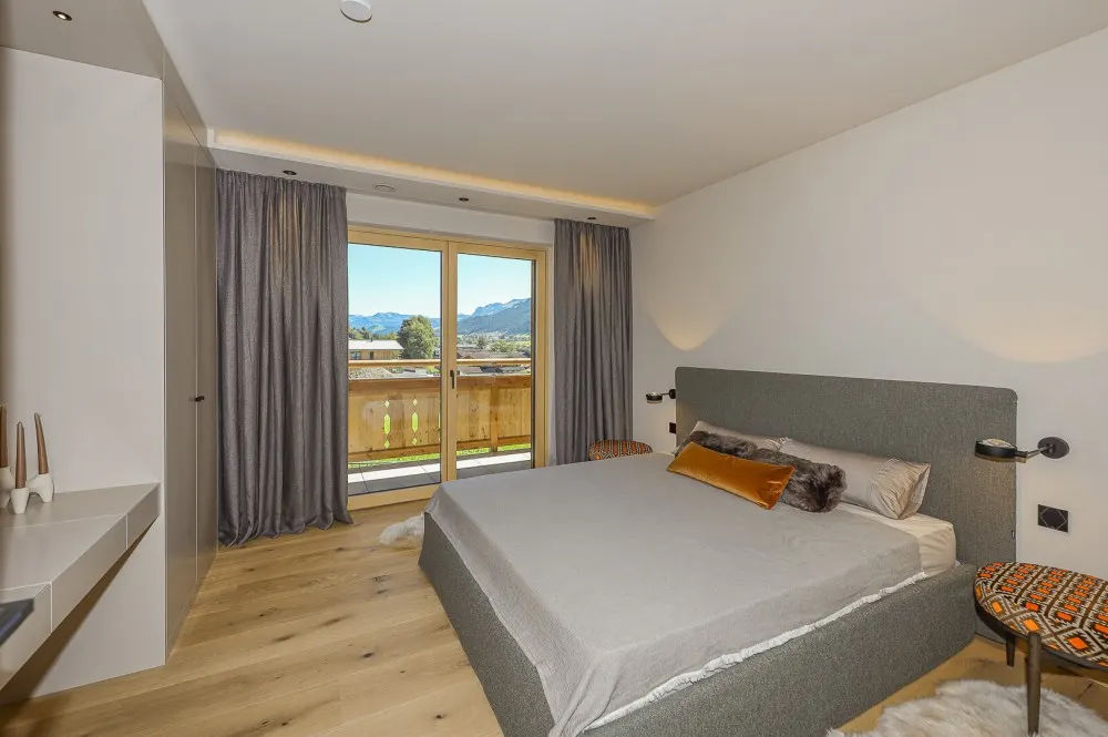 KITZIMMO-Exklusive Neubauwohnung mit traumhaftem Ausblick - Immobilien Brixen.