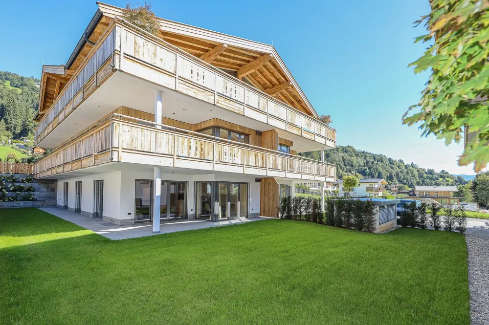 KITZIMMO-Luxuriöse Gartenwohnung mit eigenem Wellnessbereich - Immobilien Brixen.