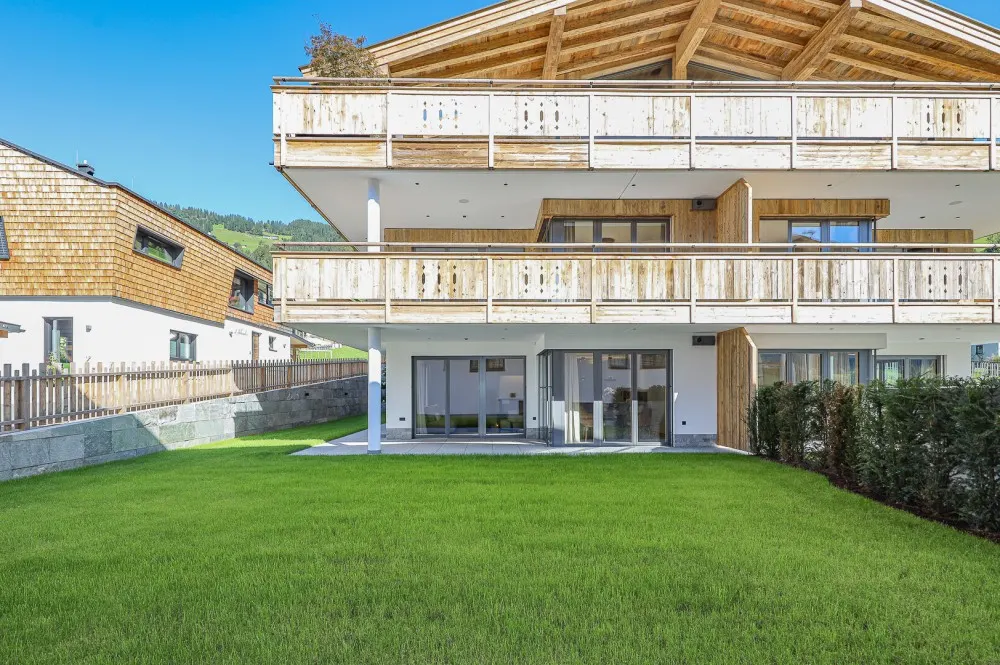 KITZIMMO-Luxuriöse Gartenwohnung mit eigenem Wellnessbereich - Immobilien Brixen.
