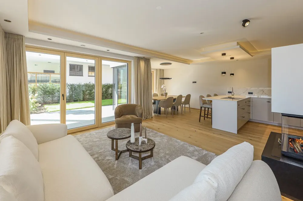 KITZIMMO-Luxuriöse Gartenwohnung mit eigenem Wellnessbereich - Immobilien Brixen.