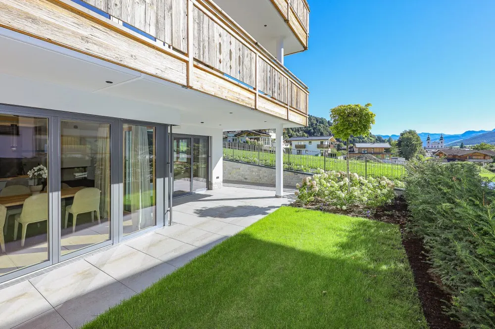 KITZIMMO-Luxuriöse Gartenwohnung mit eigenem Wellnessbereich - Immobilien Brixen.