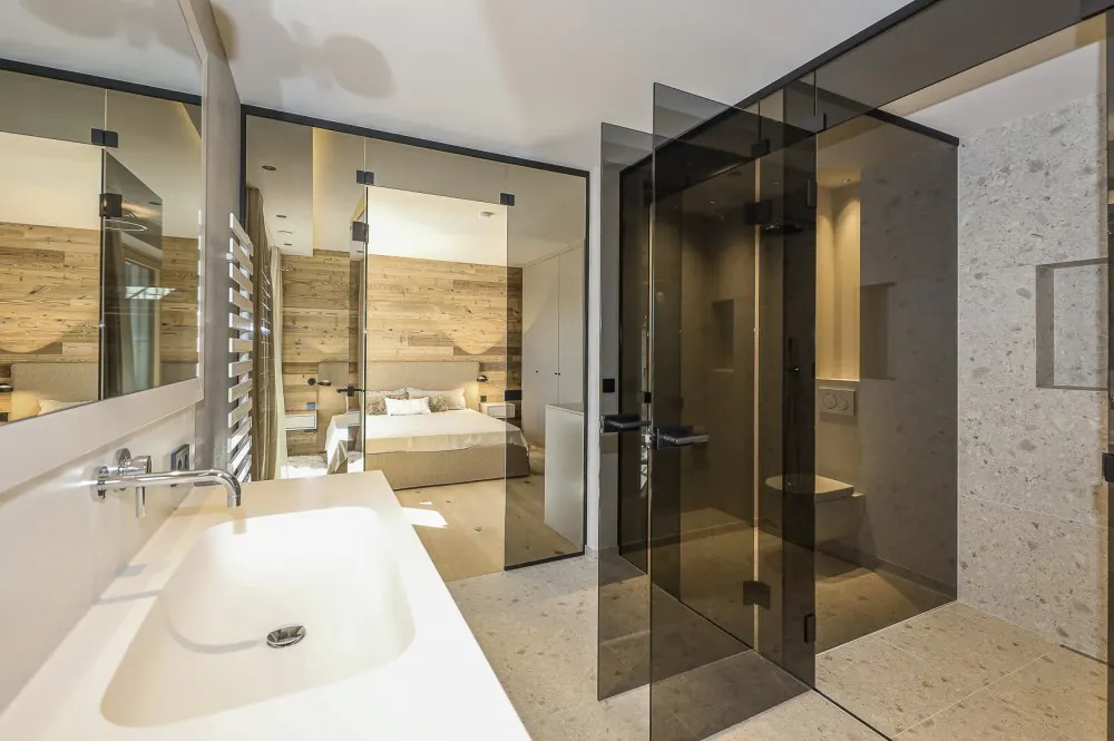 KITZIMMO-Luxuriöse Gartenwohnung mit eigenem Wellnessbereich - Immobilien Brixen.