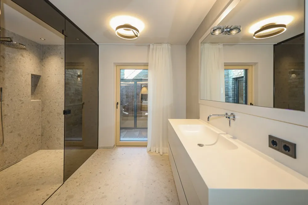 KITZIMMO-Luxuriöse Gartenwohnung mit eigenem Wellnessbereich - Immobilien Brixen.