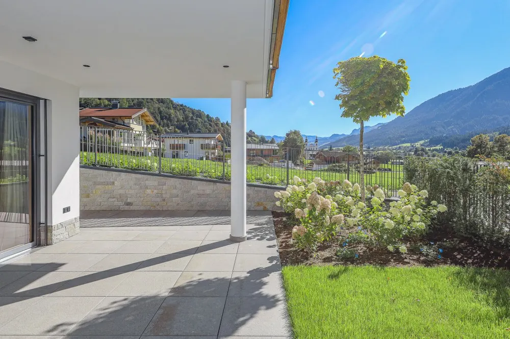 KITZIMMO-Luxuriöse Gartenwohnung mit eigenem Wellnessbereich - Immobilien Brixen.