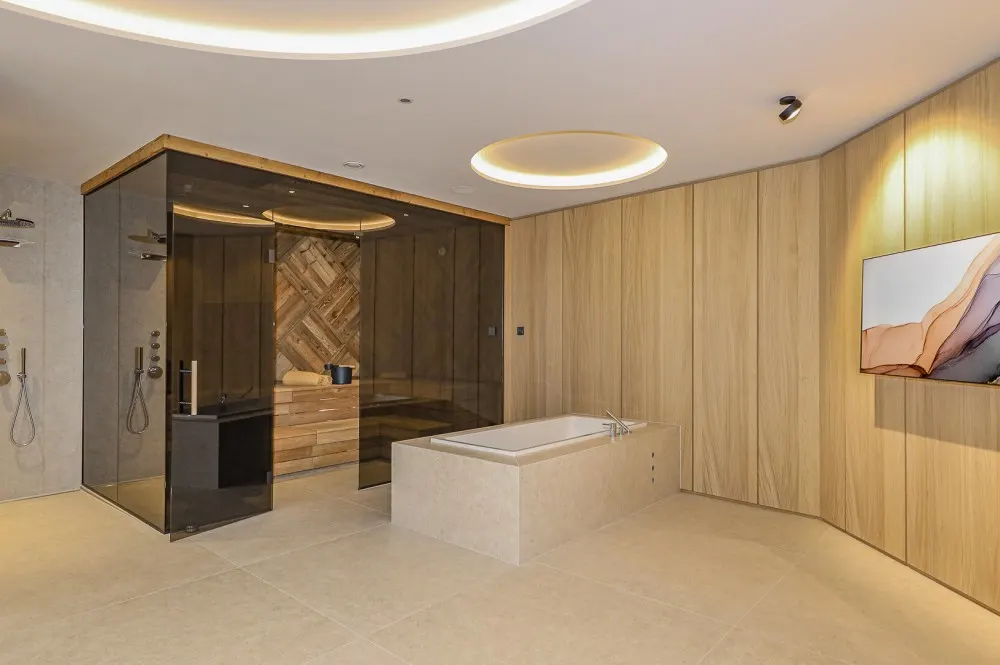 KITZIMMO-Luxuriöse Gartenwohnung mit eigenem Wellnessbereich - Immobilien Brixen.