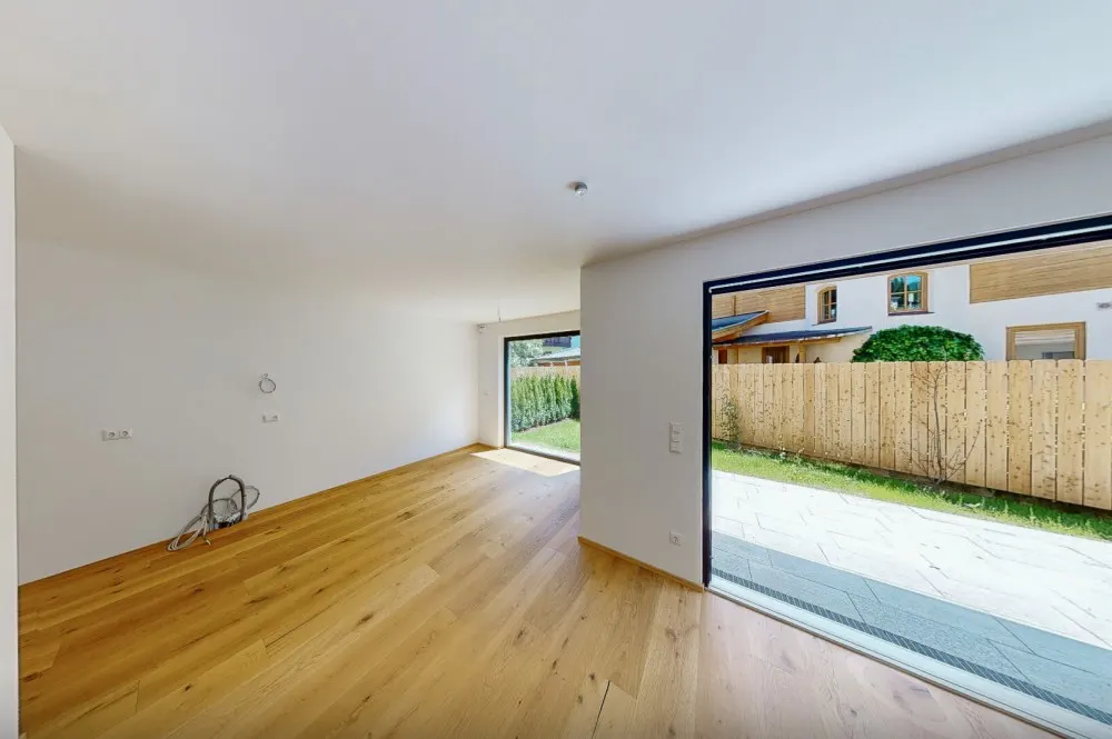 KITZIMMO-Neubau-Gartenwohnung kaufen - Immobilien Fieberbrunn Tirol.
