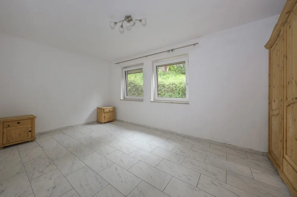 KITZIMMO-Gartenwohnung in Ruhelage kaufen - Immobilien St. Johann.