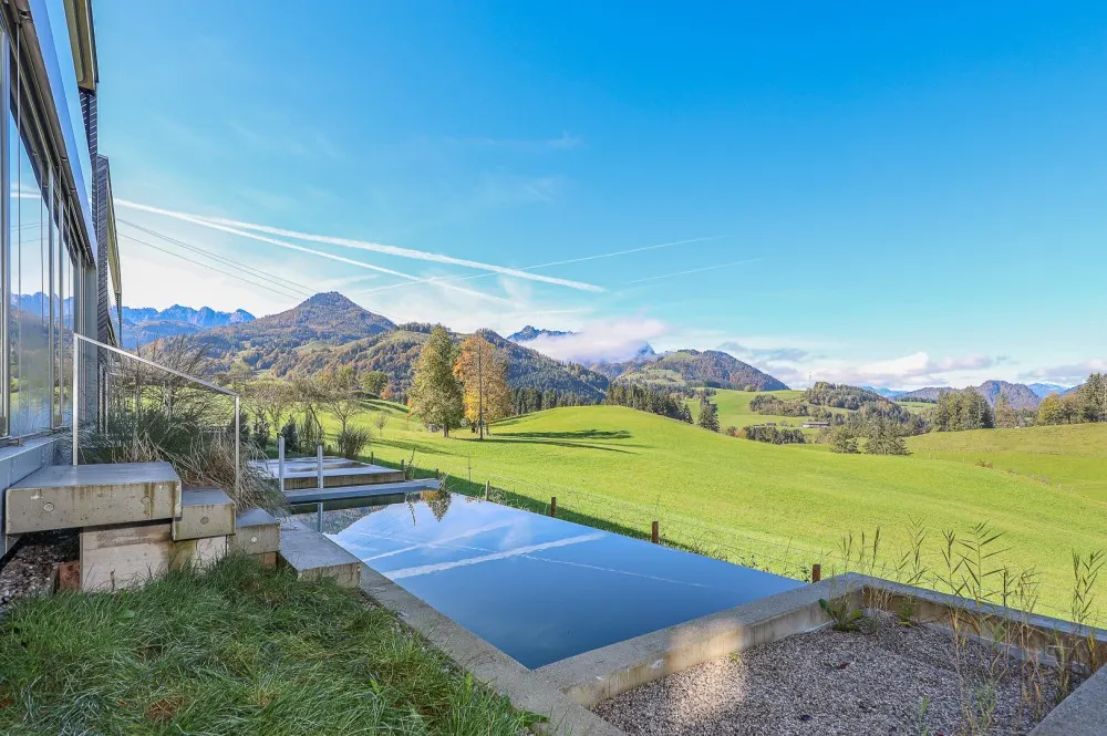 KITZIMMO-Luxusvilla mit Pool und Bergblick in Toplage kaufen - Immobilien Schwendt.