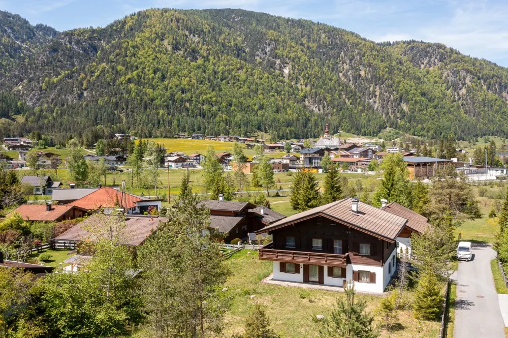 KITZIMMO-Haus mit zusätzlichem Baugrund kaufen - Immobilien St. Ulrich am Pillersee.