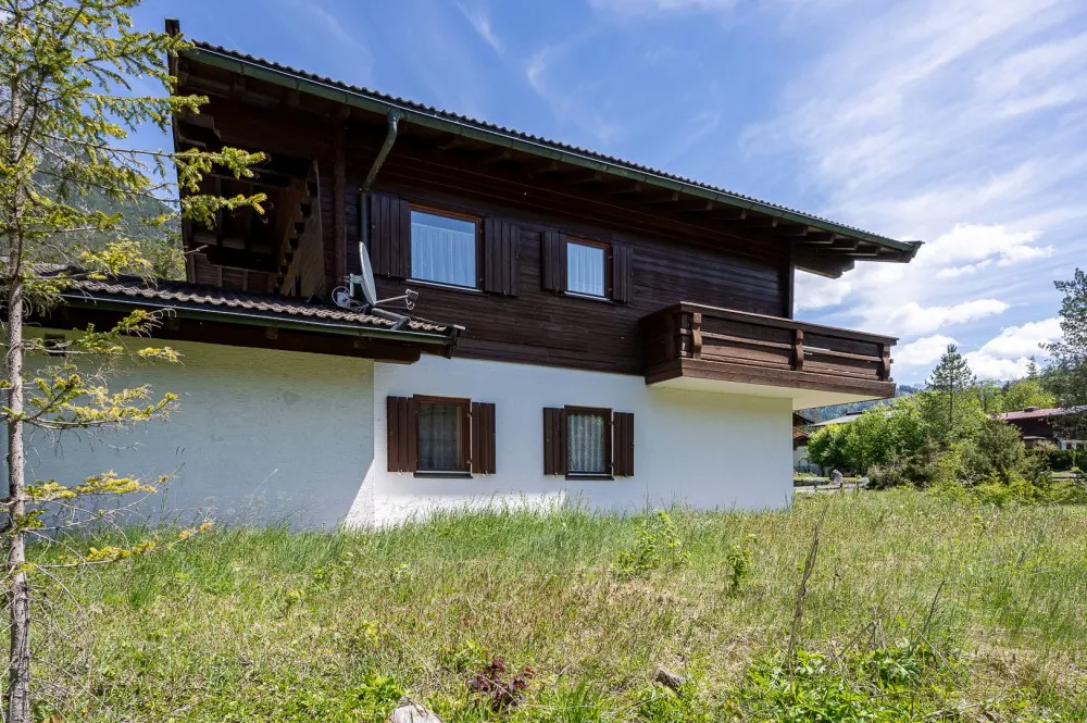 KITZIMMO-Haus mit zusätzlichem Baugrund kaufen - Immobilien St. Ulrich am Pillersee.