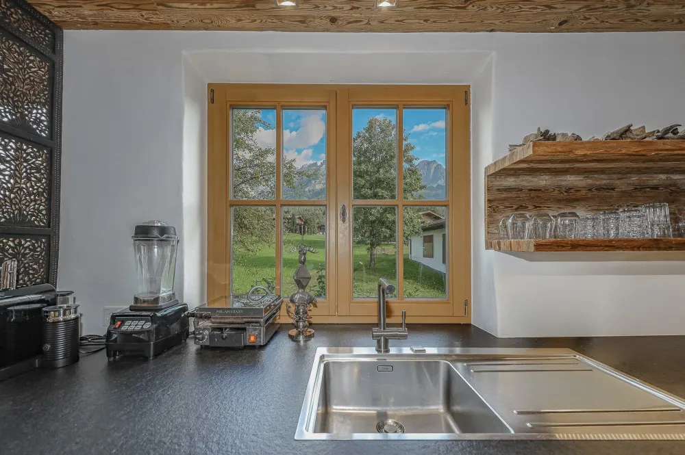 KITZIMMO-Penthouse in sonniger Ruhelage am Fuße des Wilden Kaiser - Immobilien Going.