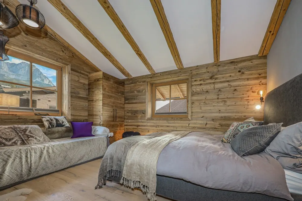 KITZIMMO-Penthouse in sonniger Ruhelage am Fuße des Wilden Kaiser - Immobilien Going.