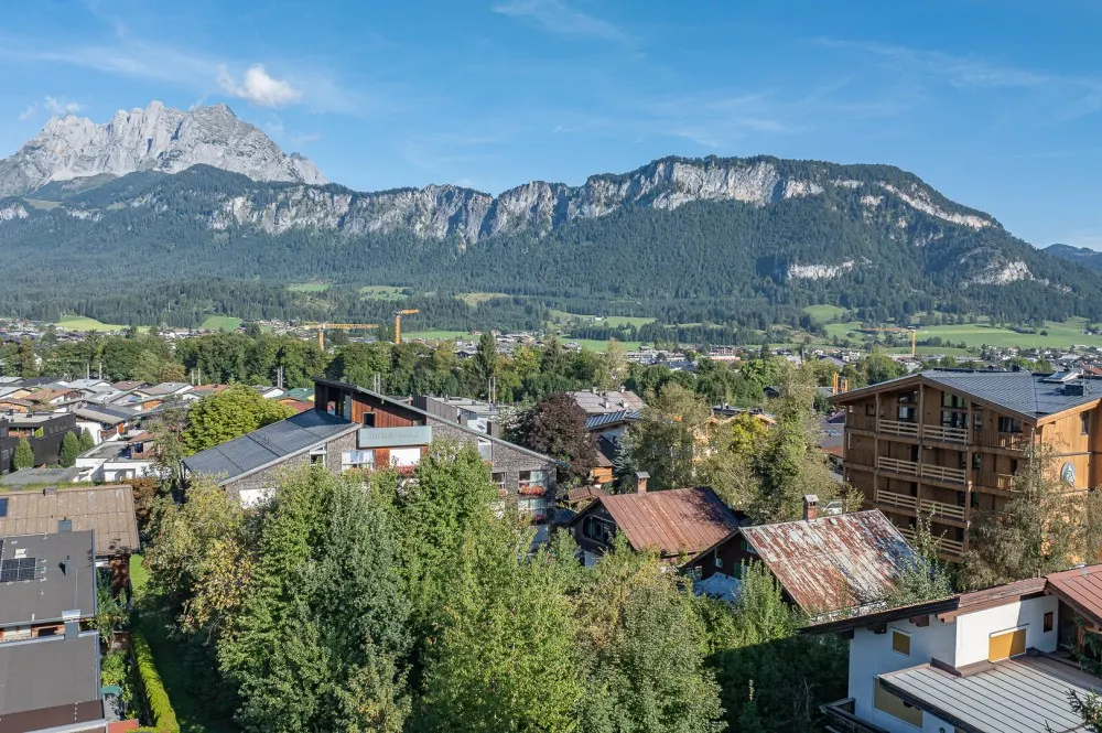 KITZIMMO-Baugrund in zentraler Toplage mit Apparthotel Projektierung - Immobilien St. Johann.
