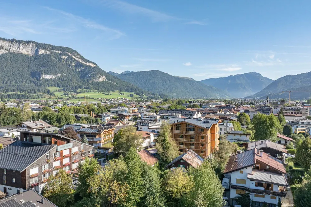 KITZIMMO-Baugrund in zentraler Toplage mit Apparthotel Projektierung - Immobilien St. Johann.