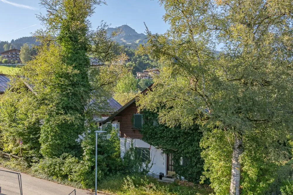 KITZIMMO-Baugrund in zentraler Toplage mit Apparthotel Projektierung - Immobilien St. Johann.