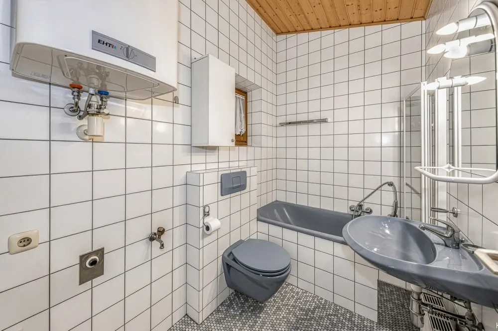 KITZIMMO-Dachgeschosswohnung mit Bergblick kaufen - Immobilien Kitzbühel.-10