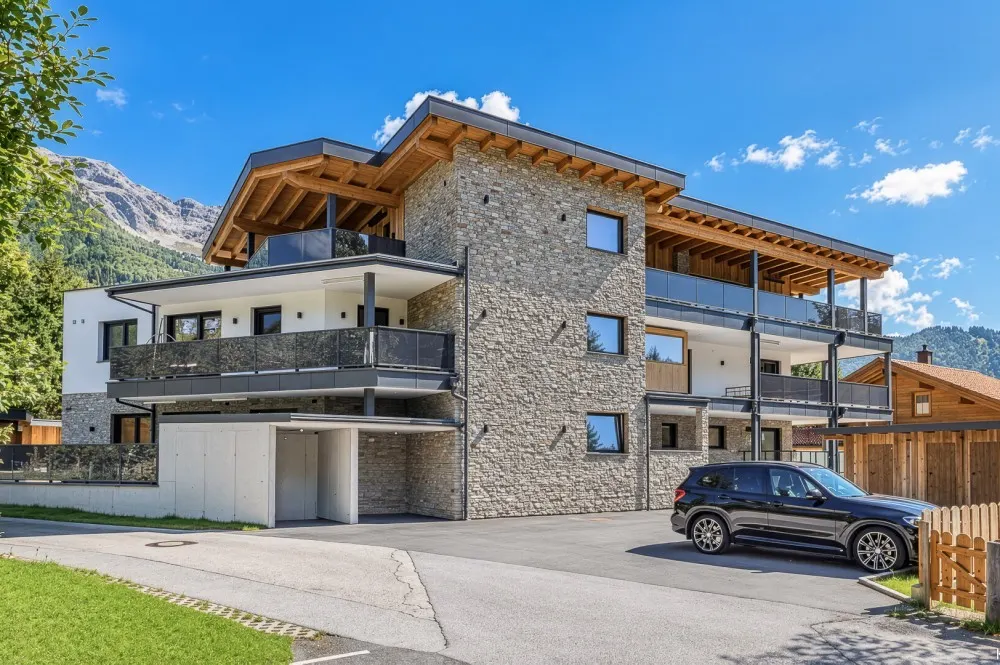 KITZIMMO-Gartenmaisonette in St. Ulrich am Pillersee.-1-1