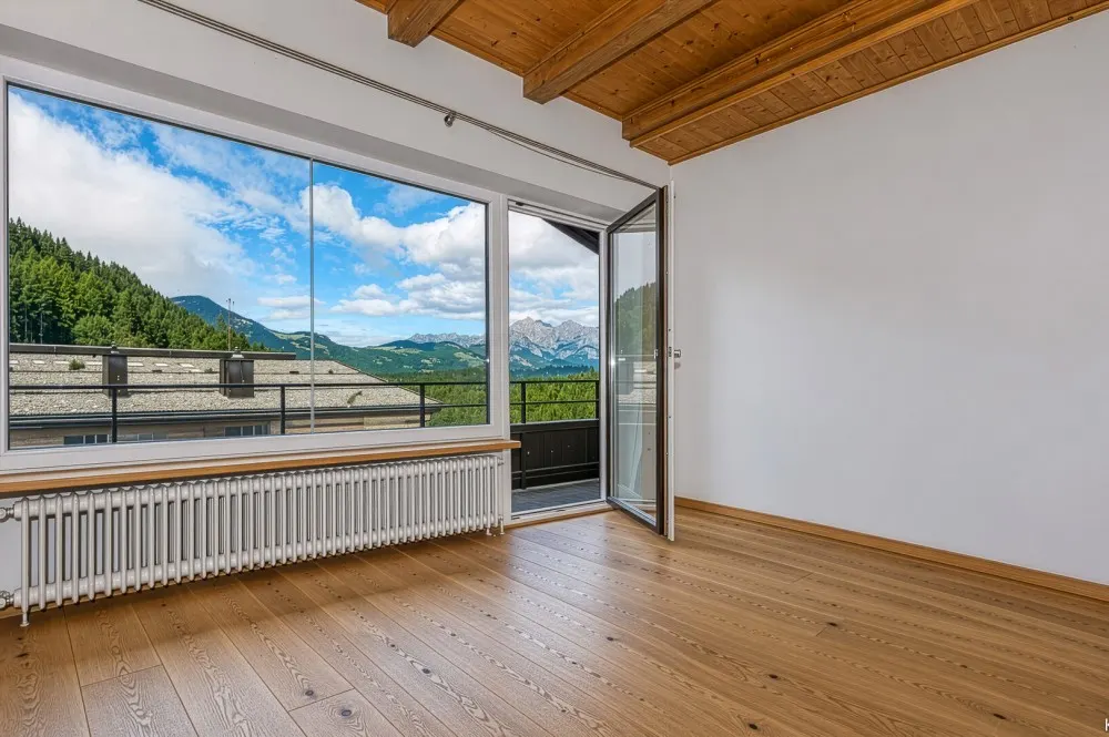 KITZIMMO-Dachgeschosswohnung an der Skipiste mit Kaiserblick kaufen - Immobilien Kitzbühel.-5-3