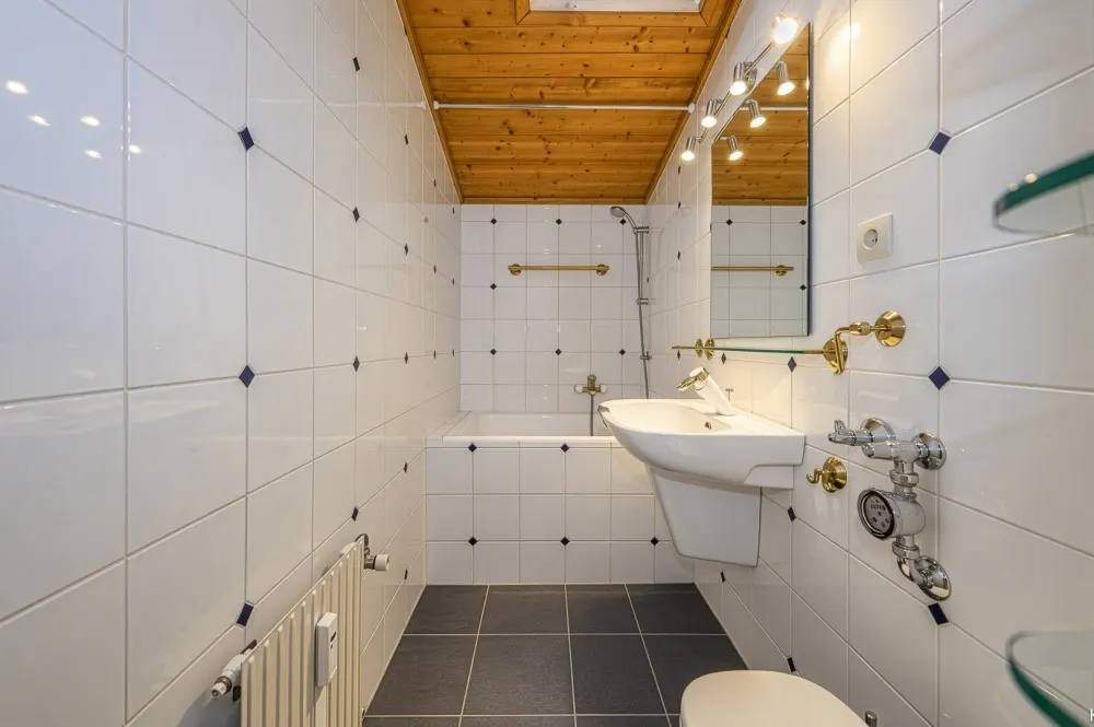 KITZIMMO-Dachgeschosswohnung an der Skipiste mit Kaiserblick kaufen - Immobilien Kitzbühel.-5-12