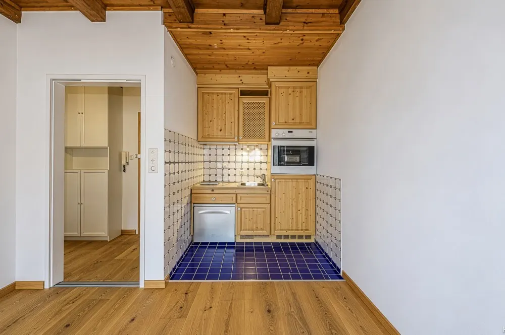 KITZIMMO-Dachgeschosswohnung an der Skipiste mit Kaiserblick kaufen - Immobilien Kitzbühel.-5-6