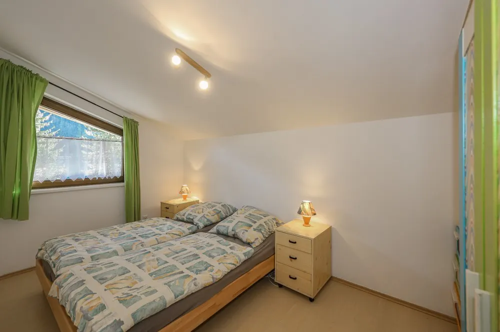 KITZIMMO-Dachgeschosswohnung mit schönem Ausblick kaufen - Immobilien Jochberg.