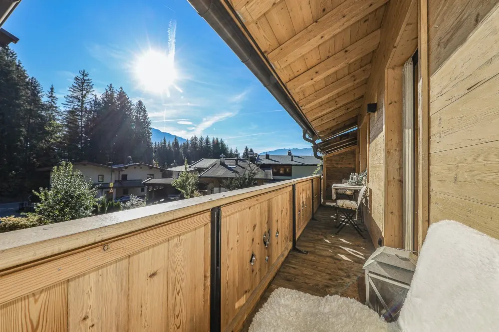 KITZIMMO-Exklusive Dachgeschosswohnung in idyllischer Lage - Immobilien Oberndorf.