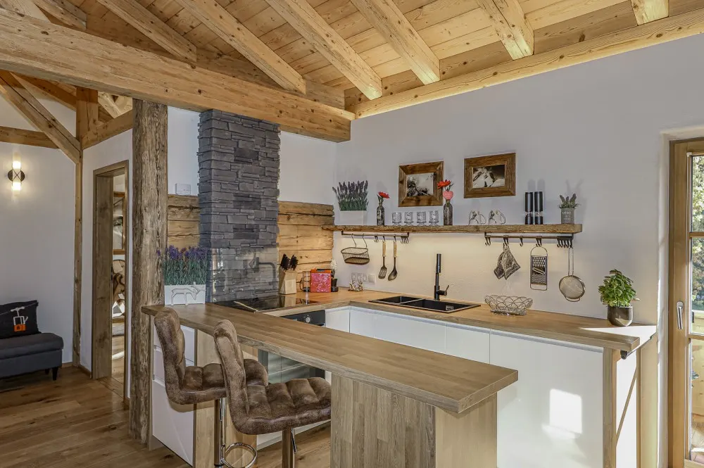 KITZIMMO-Exklusive Dachgeschosswohnung in idyllischer Lage - Immobilien Oberndorf.