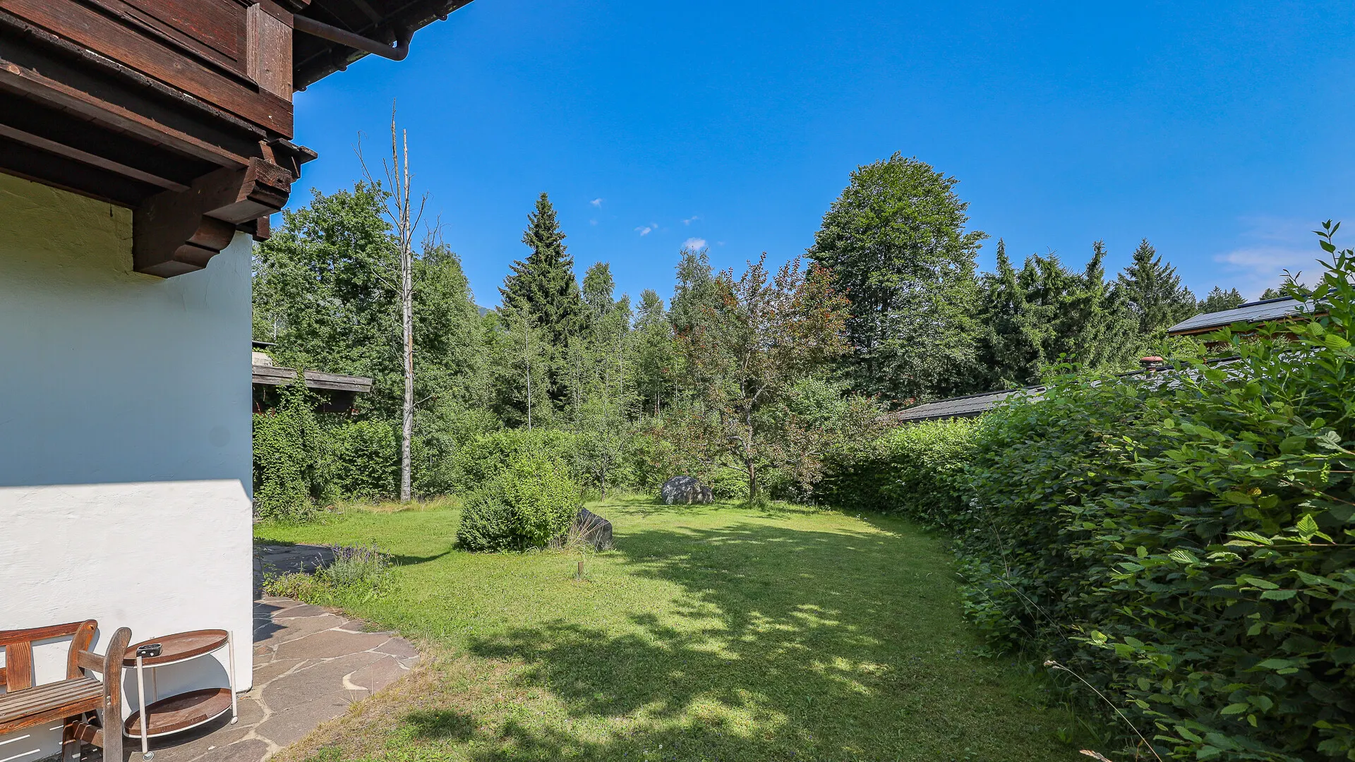 KITZIMMO-Baugrundstück mit Altbestand auf der Bichlalm kaufen - Immobilien Kitzbühel.