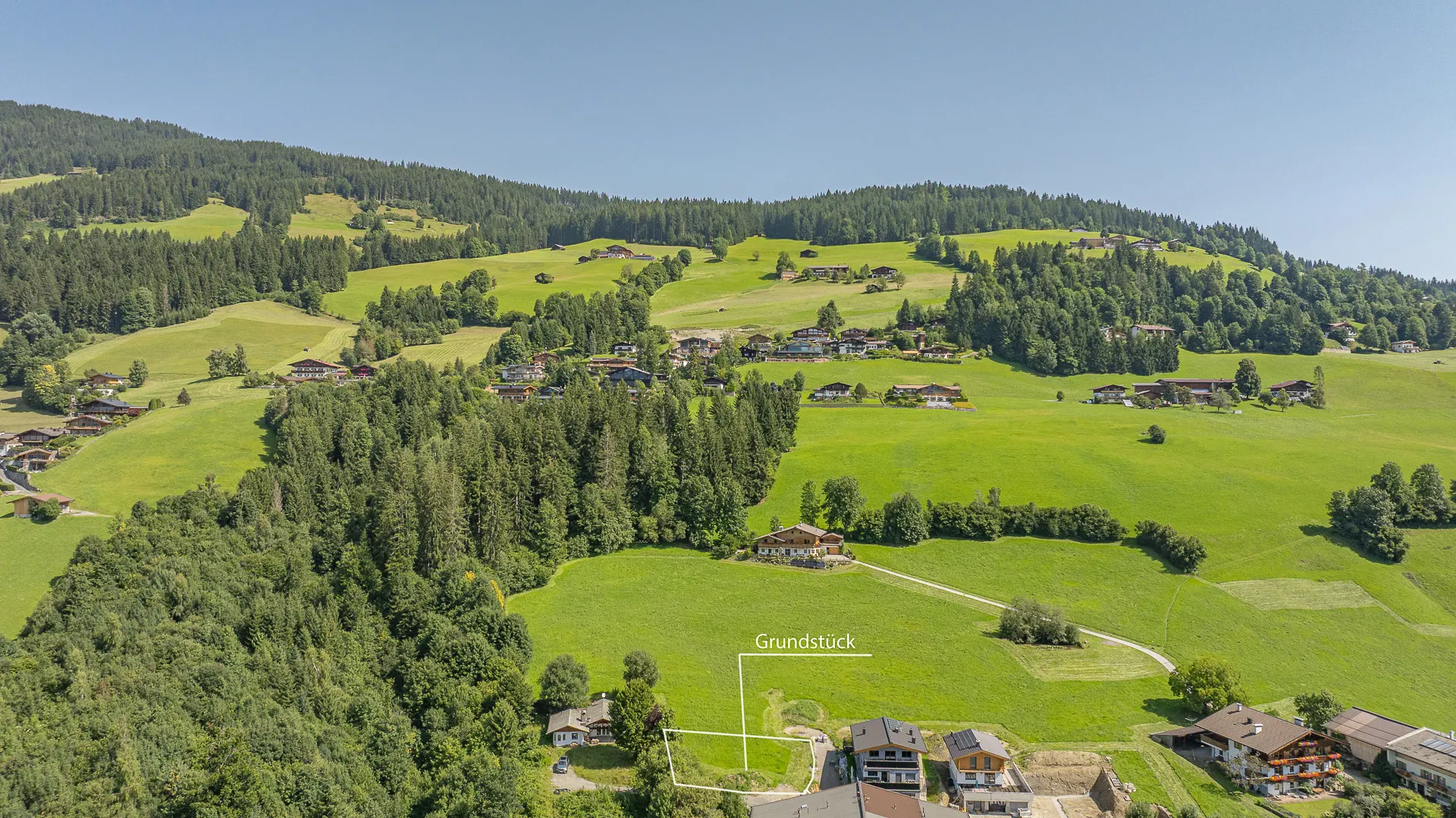 KITZIMMO-Baugrundstück in traumhafter Aussichtslage am Sonnberg - Immobilien Kirchberg.