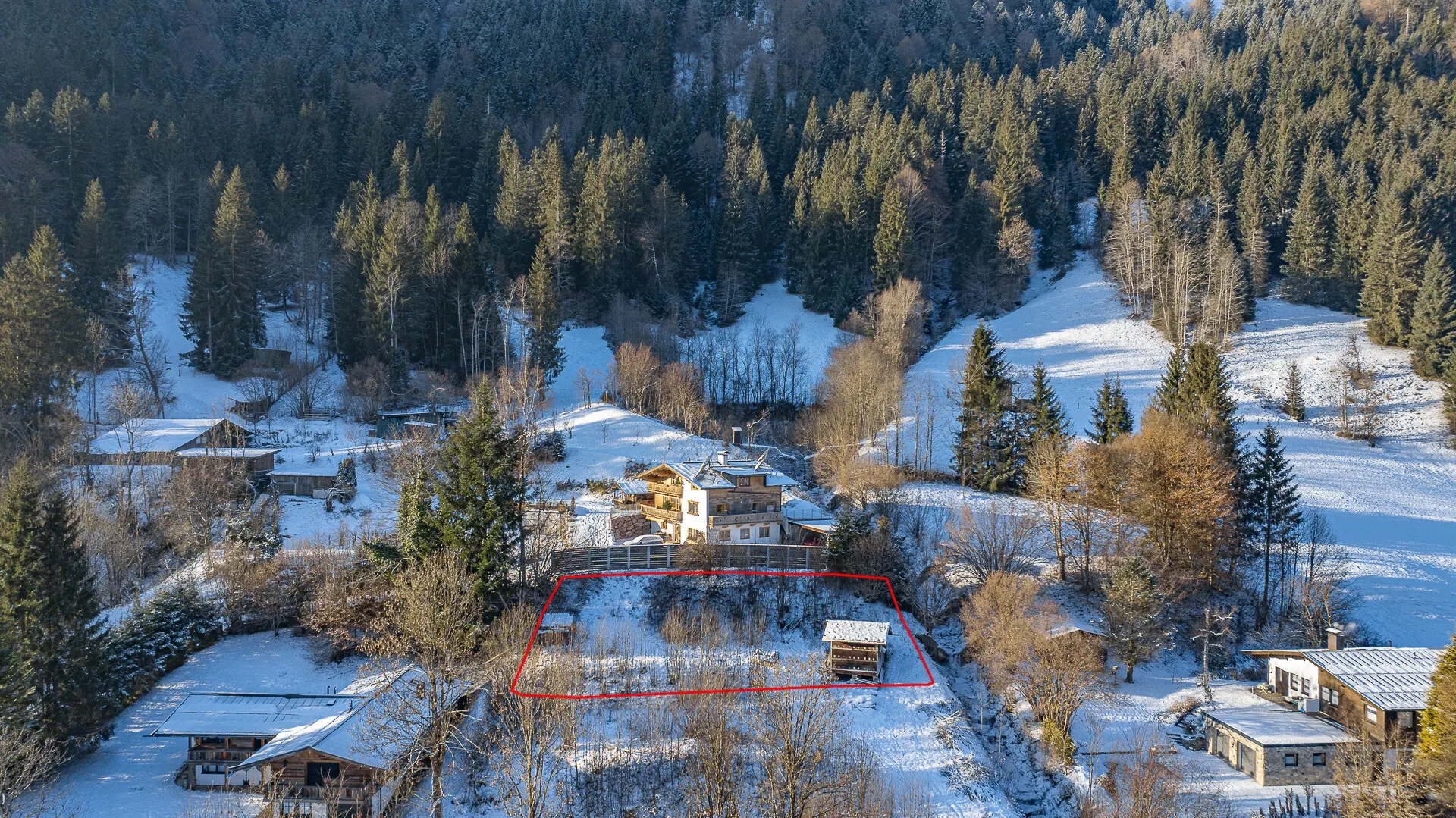 KITZIMMO-Grundstück für Einheimische in sonniger Ruhelage kaufen - Immobilien Kitzbühel.