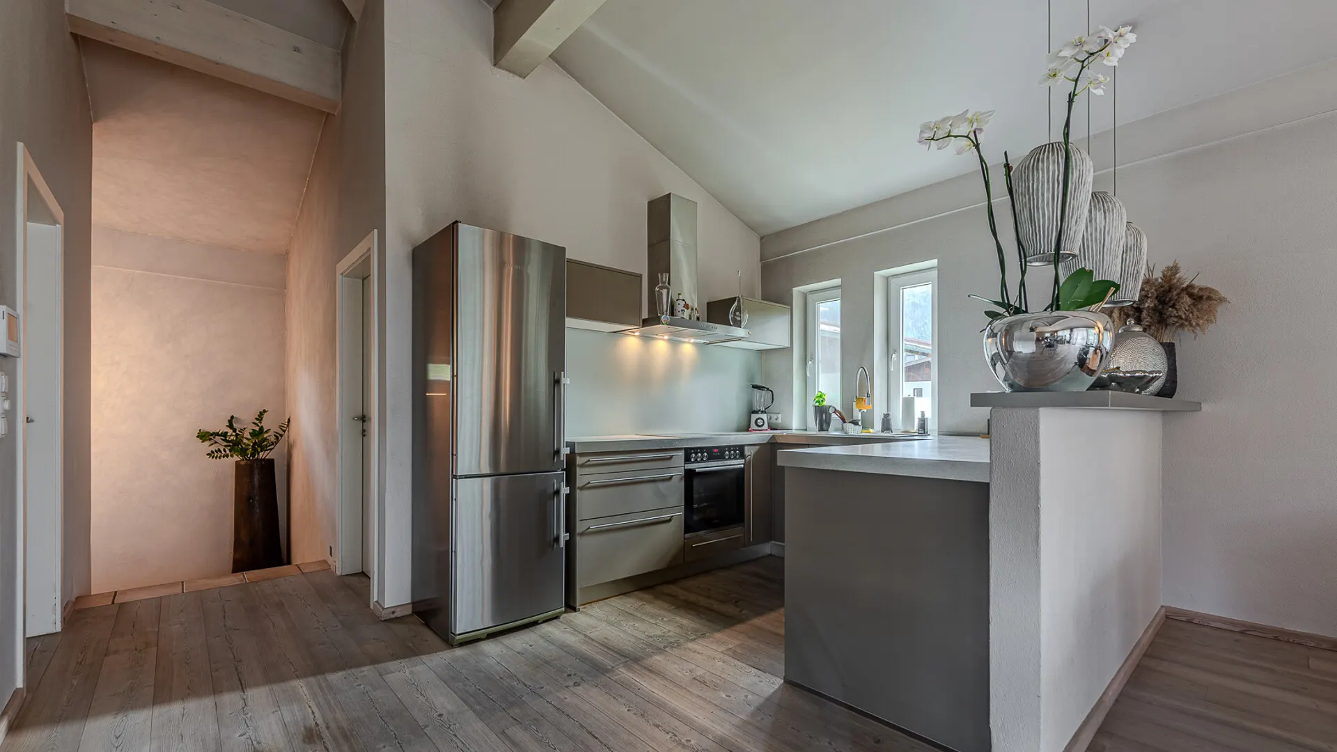 KITZIMMO-Hochwertige Haushälfte am Golfplatz kaufen - Immobilien Kitzbühel.