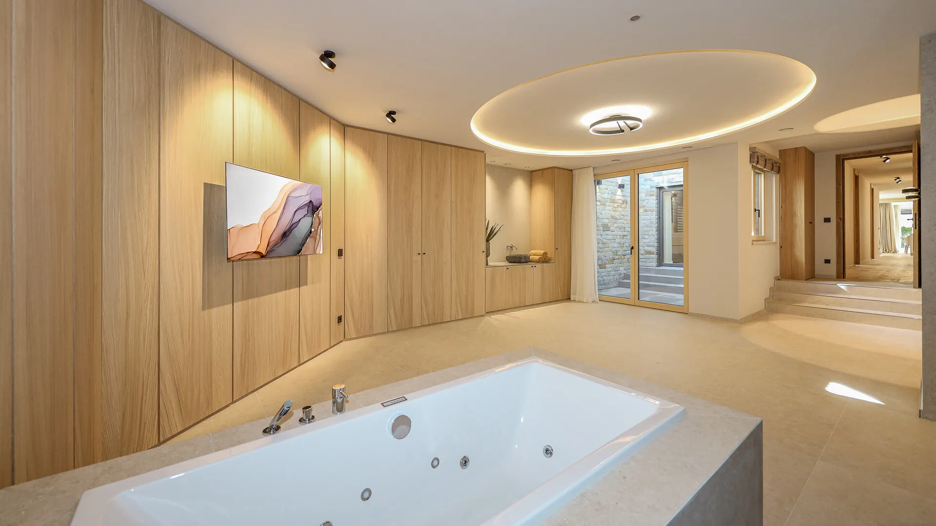 KITZIMMO-Luxuriöse Gartenwohnung mit eigenem Wellnessbereich - Immobilien Brixen.