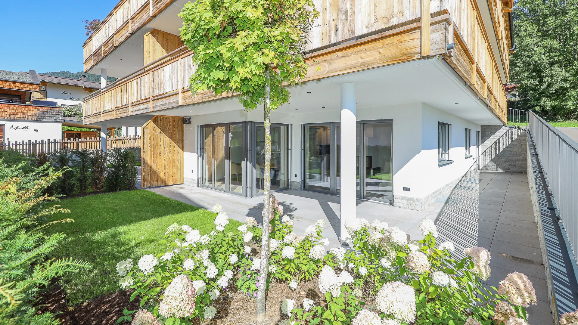 KITZIMMO-Luxuriöse Gartenwohnung mit eigenem Wellnessbereich - Immobilien Brixen.