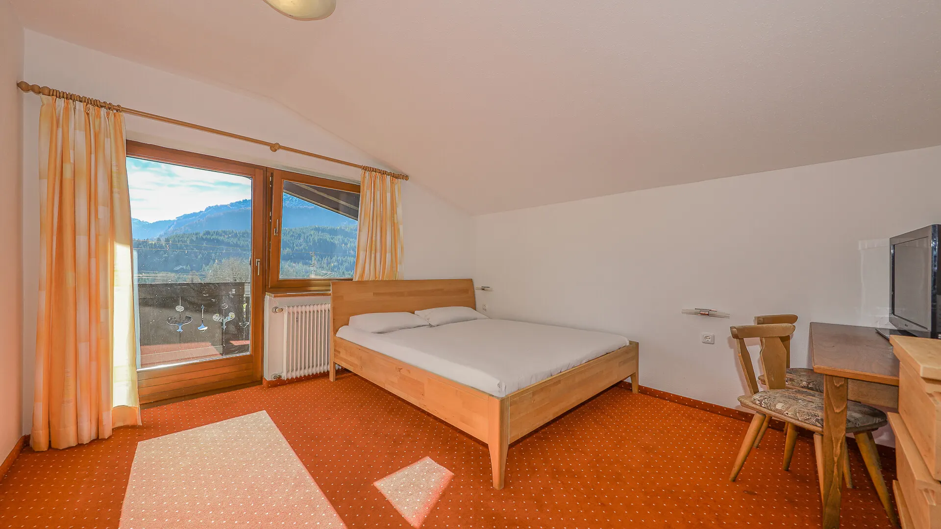 KITZIMMO-Apartmenthaus mit traumhaftem Ausblick kaufen - Immobilien Fieberbrunn.