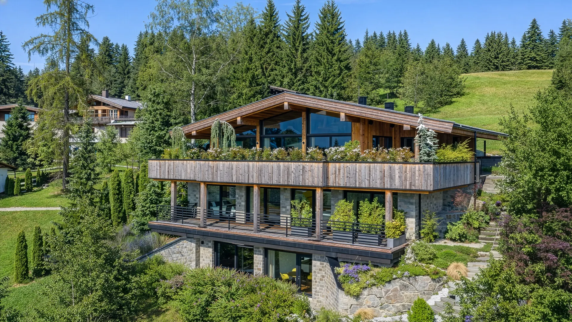 KITZIMMO-Luxusvilla mit Pool in Toplage kaufen - Immobilien Reith bei Kitzbühel.