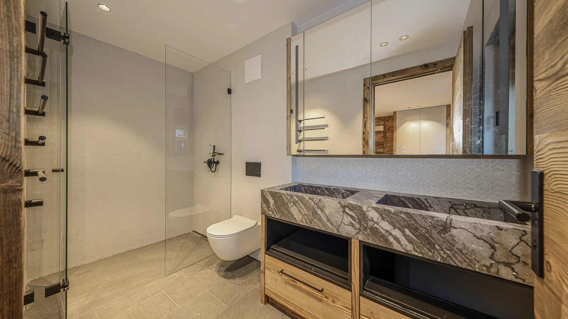 KITZIMMO-Elegante Erdgeschossmaisonette nahe dem Skilift kaufen - Immobilien Kitzbühel.