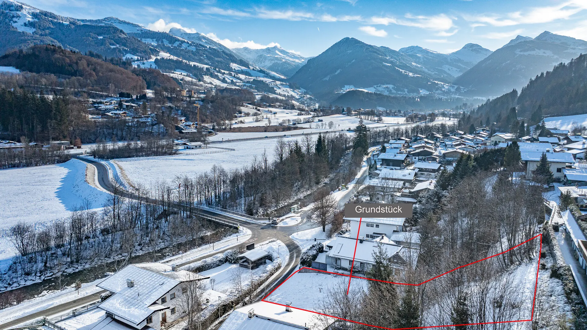 KITZIMMO-Grundstück mit Baugenehmigung für 3-Luxuswohnungen - Immobilien Kitzbühel.