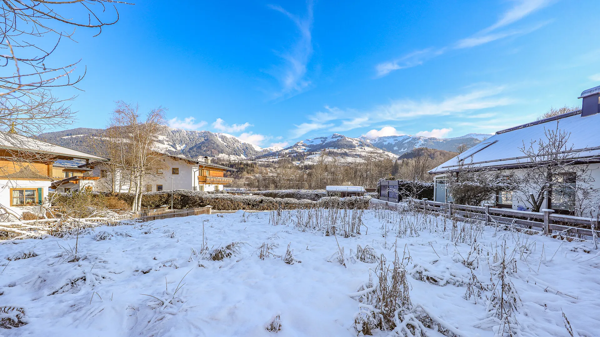 KITZIMMO-Grundstück mit Baugenehmigung für 3-Luxuswohnungen - Immobilien Kitzbühel.