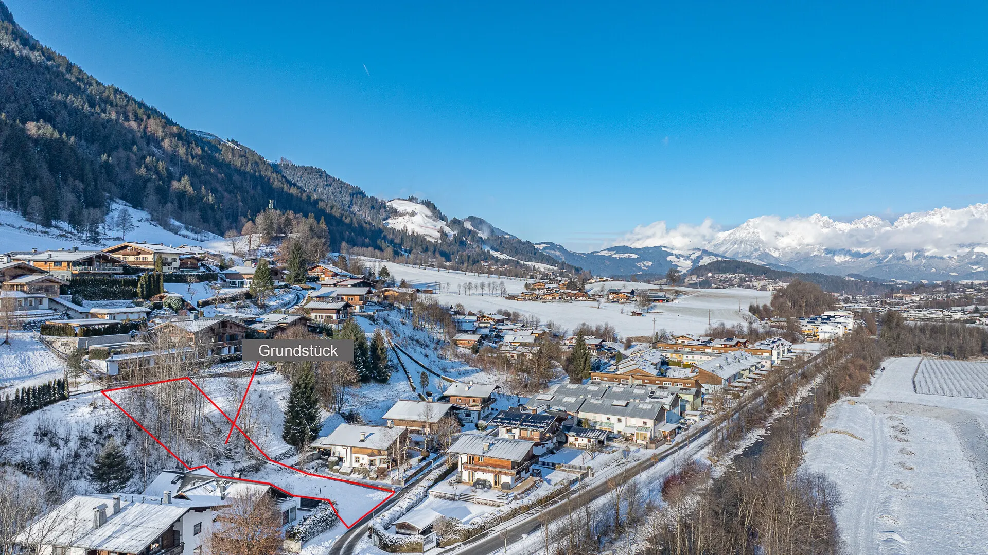 KITZIMMO-Grundstück mit Baugenehmigung für 3-Luxuswohnungen - Immobilien Kitzbühel.