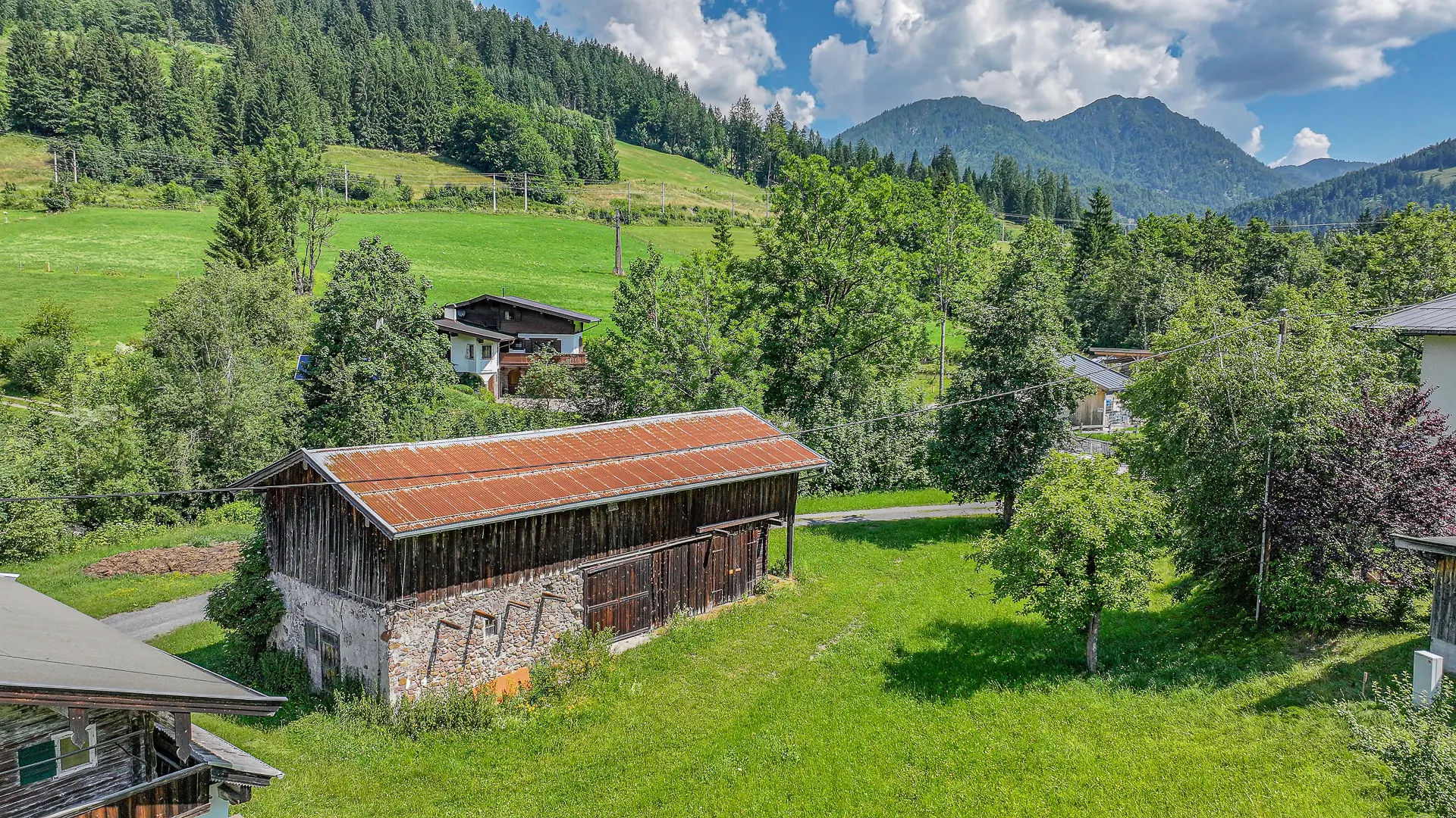 KITZIMMO-Baugrundstück mit Planung für ein Einfamilienhaus - Immobilien Hochfilzen.