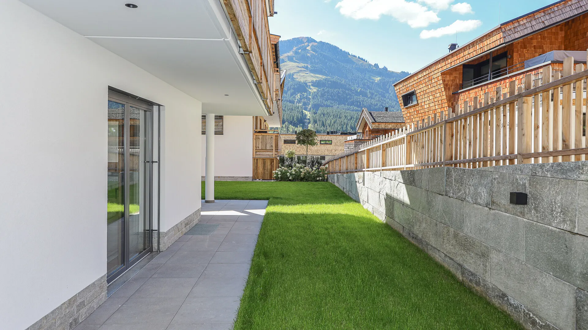 KITZIMMO-Luxuriöse Gartenwohnung mit eigenem Wellnessbereich - Immobilien Brixen.