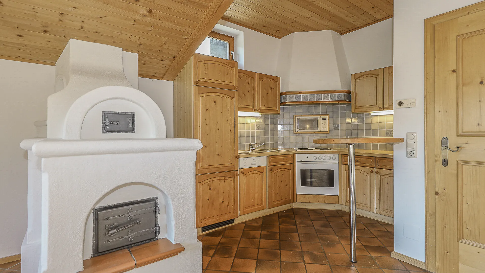 KITZIMMO-Dachgeschosswohnung in sonniger Ruhelage - Immobilien Jochberg.