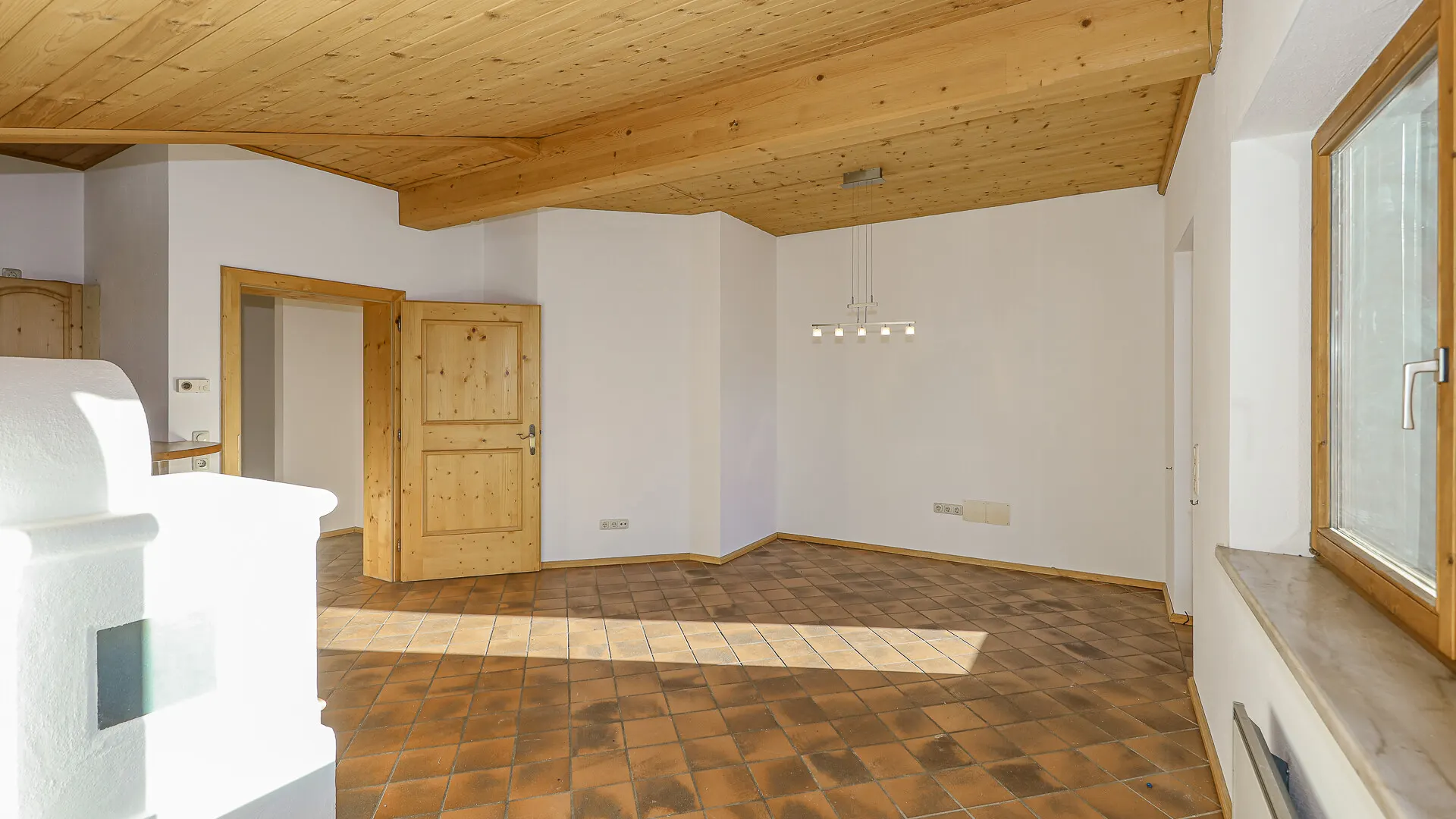 KITZIMMO-Dachgeschosswohnung in sonniger Ruhelage - Immobilien Jochberg.