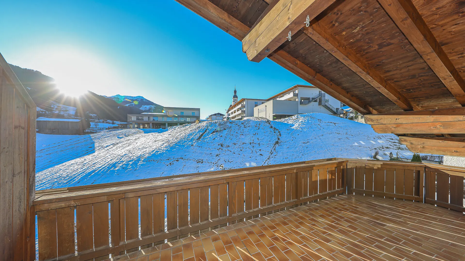 KITZIMMO-Dachgeschosswohnung in sonniger Ruhelage - Immobilien Jochberg.